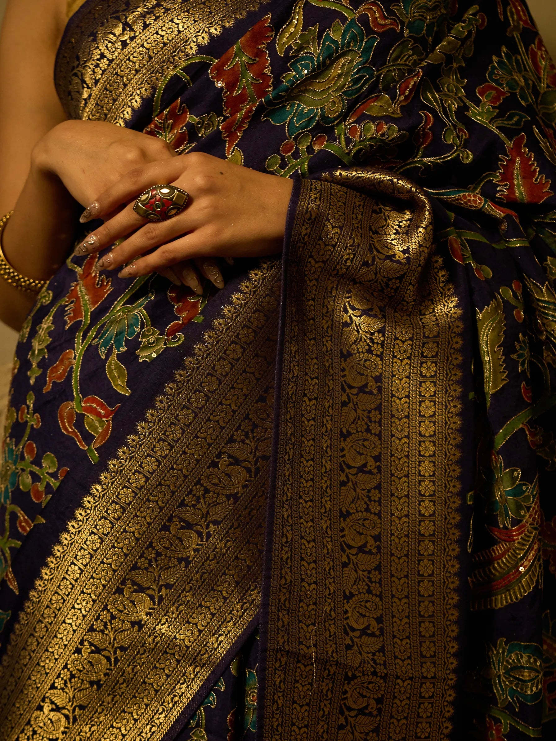 Jamawar-patterned pallu with gold Zardozi border of navy blue Kalamkari soft silk saree