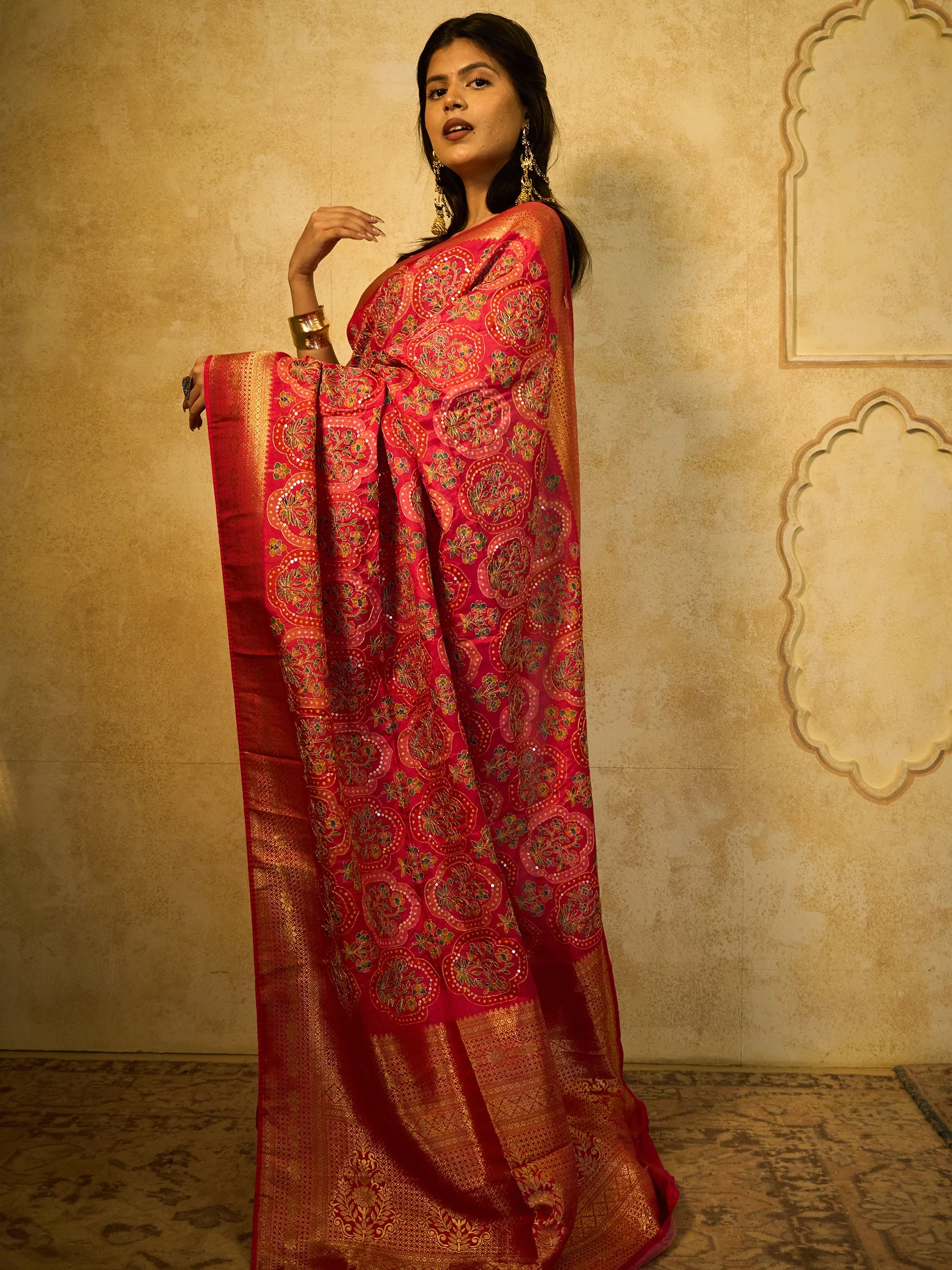 Full drape view of pink Eri silk Bandhani Jamawar saree with gold Zari border and sequin Zardozi embroidery