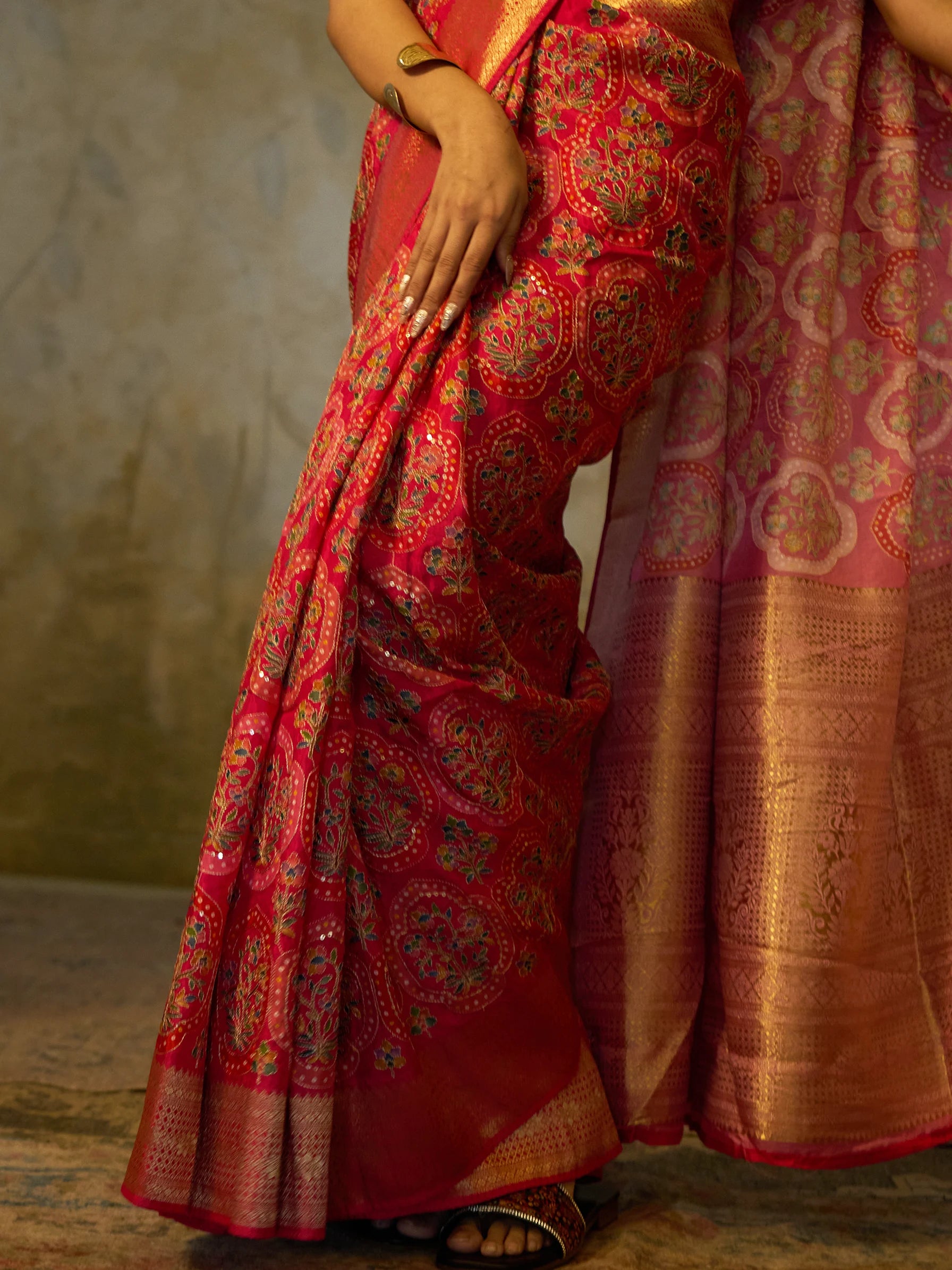 Matching pink embroidered blouse piece included with Bandhani Jamawar Eri silk saree