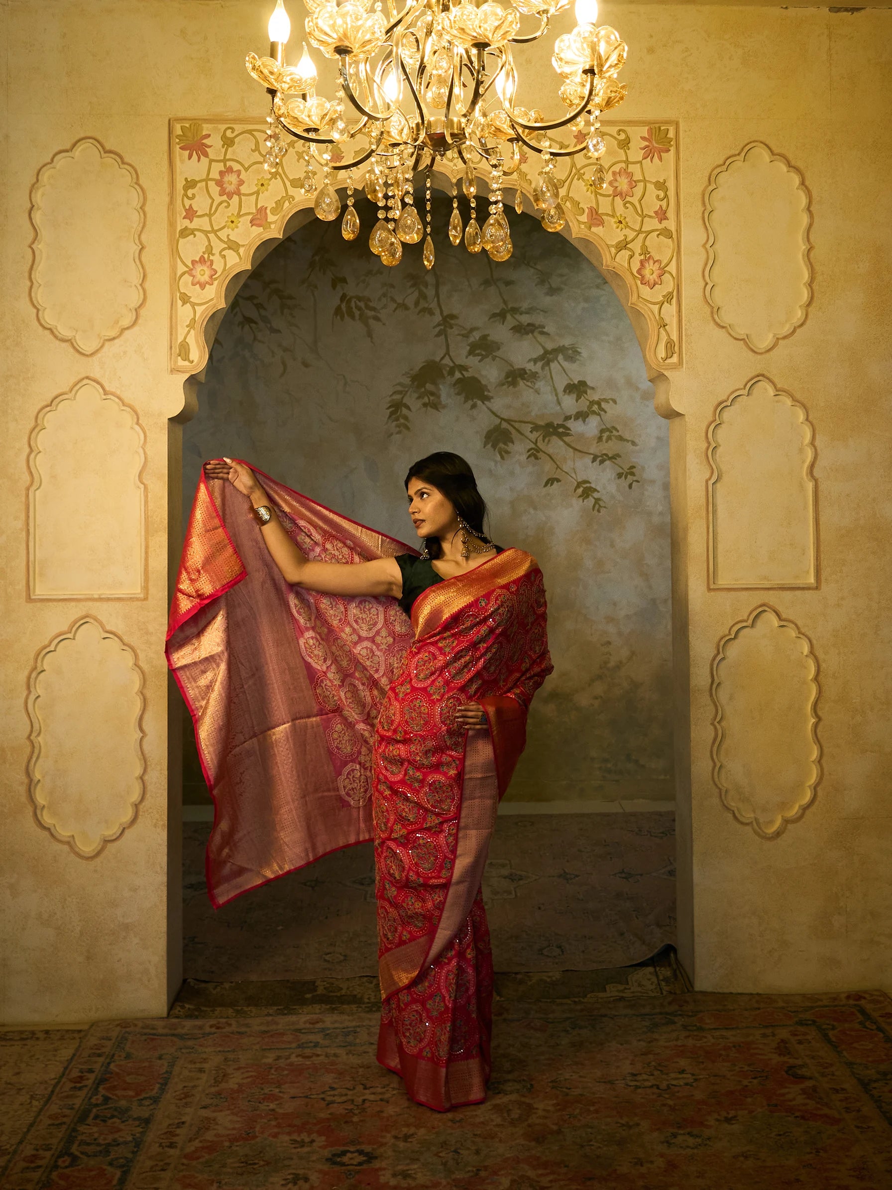 Flat lay texture of pink Eri vegan silk saree showing Zardozi embroidery, sequin embellishment and Jamawar medallion motif detail